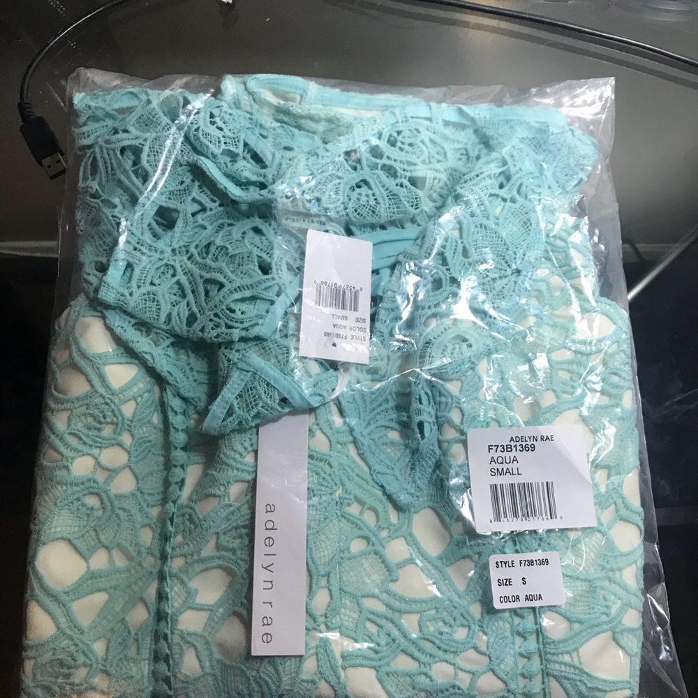 Brand new adelyn Rae romper aqua
